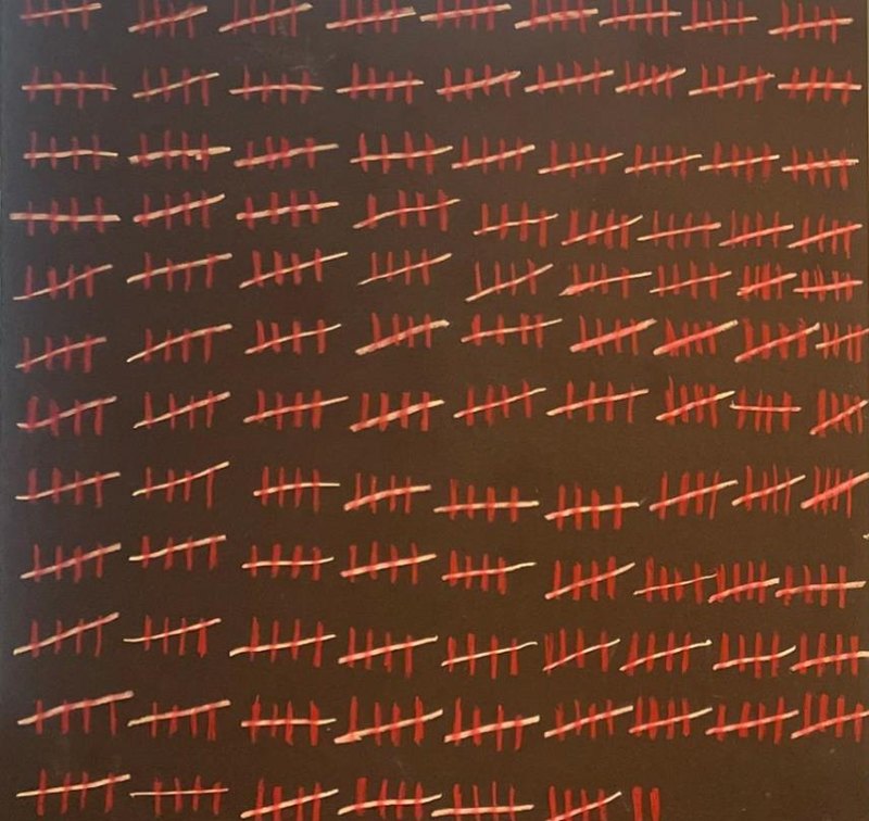 Painting by Hertz Nazaire: hundreds of red tally marks in groups of five on a dark background